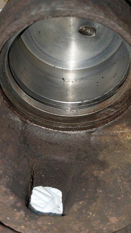 Driver side brake piston caliper bore.jpg